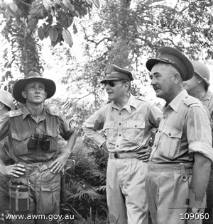 Australian Lt Col Mervyn Jeanes, US Gen Douglas MacArthur, and Australian Lt Gen Leslie Morshead inspecting positions held by Jeanes' men of 2/43rd Infantry Battalion at Labuan, Borneo, 10 Jun 1945