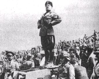 Benito Mussolini giving a speech atop a L3/35 tankette, date unknown