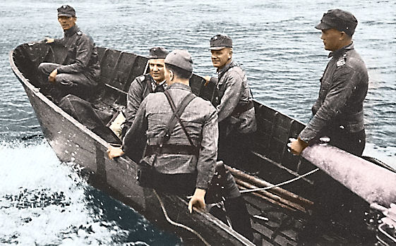 Finnish Army officer Pajari in a boat in a river, 1940s