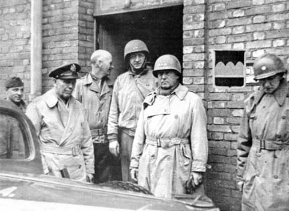 US Army generals George Marshall, Horace McBride, Manton Eddy, and George Patton at US 80th Division headquarters at Dieulouard, France, early 1945
