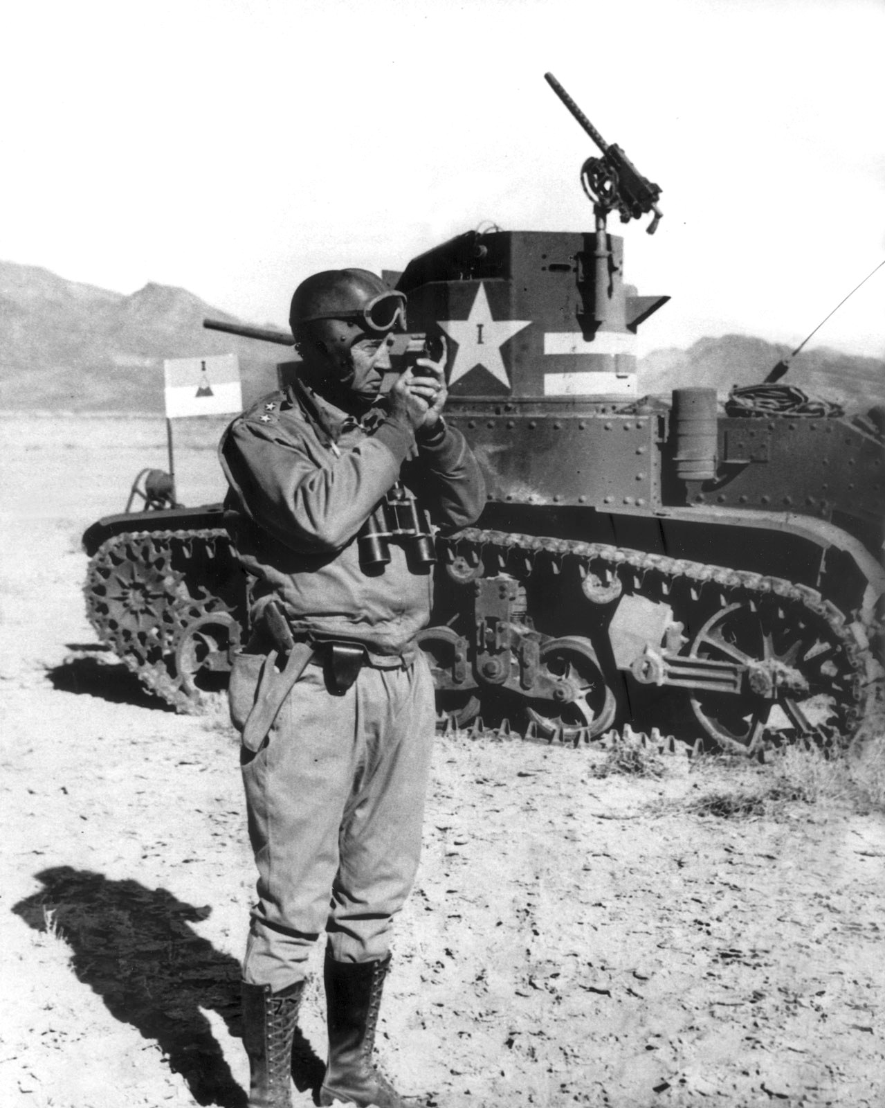 George Patton next to a M3 light tank, possibly in California, United States, 1942