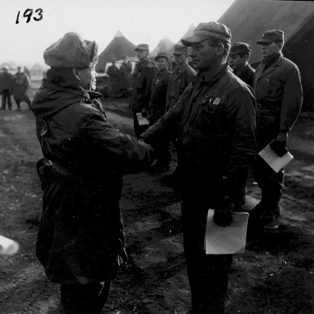 Colonel Lewis Puller decorating Staff Sergeant Edward Hanrahan with the Bronze Star Medal, Masan, southern Korea, 1950
