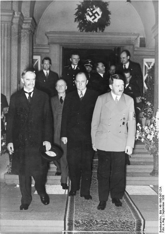 Neville Chamberlain and Adolf Hitler at Rheinhotel Dreesen, Bad Godesberg, Bonn, Germany, 22-24 Sep 1938; note Joachim von Ribbentrop in background