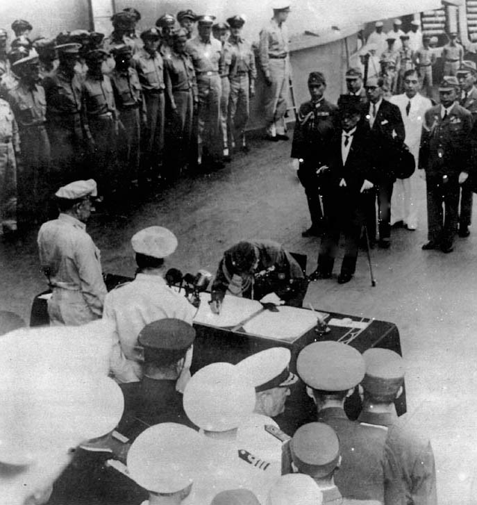 General Umezu signing the instrument of surrender, Tokyo Bay, Japan, 2 Sep 1945, photo 2 of 4