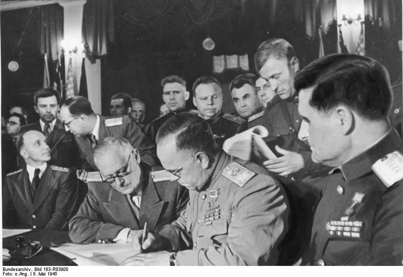 Georgi Zhukov signing the German surrender document, Karlshorst, Berlin, Germany, 8 May 1945, photo 1 of 2