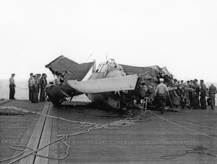 FM-1 aircraft having crashed into several TBF aircraft while landing on the flight deck of USS Coral Sea, 11 Oct 1943, photo 3 of 3