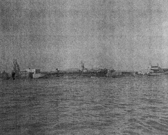 USS Anzio at anchor in the Huangpu River, Shanghai, China, Dec 1945