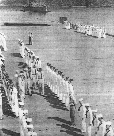 Captain Paul W. Watson of USS Coral Sea inspecting the S Division on the flight deck, 27 May 1944