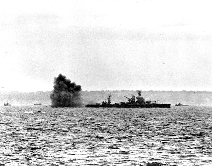 Battleship Arkansas firing her 12-in guns on German positions off Omaha Beach, Normandy, France, 6 Jun 1944