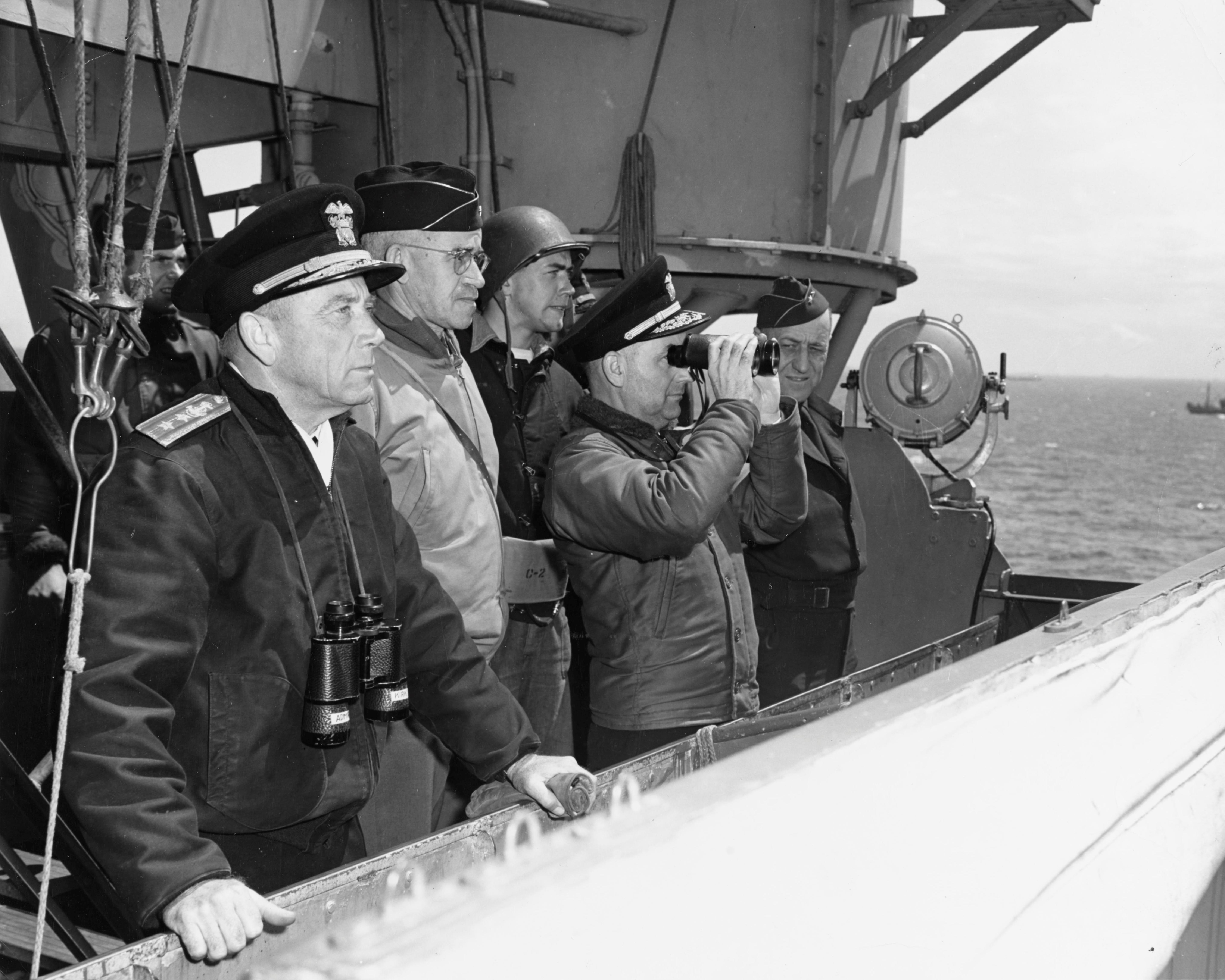 Rear Admiral Alan Kirk, Lieutenant General Omar Bradley, Rear Admiral Arthur Struble, Major General Hugh Keen, aboard USS Augusta off Normandy, France, 8 Jun 1944
