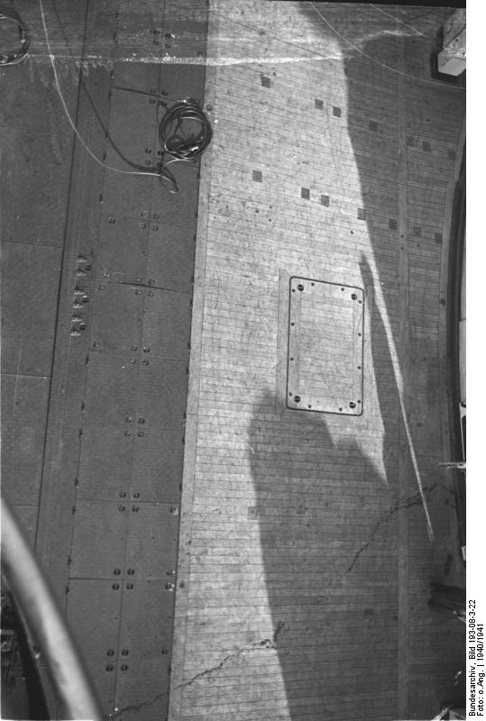Looking down from battleship Bismarck's superstructure at the area of the aircraft catapult, 1940-1941, photo 2 of 2