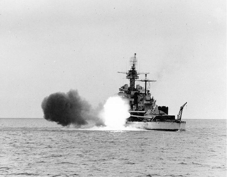 Battleship Colorado bombarding Okinawa, Japan, 29 Mar 1945; cropped photo