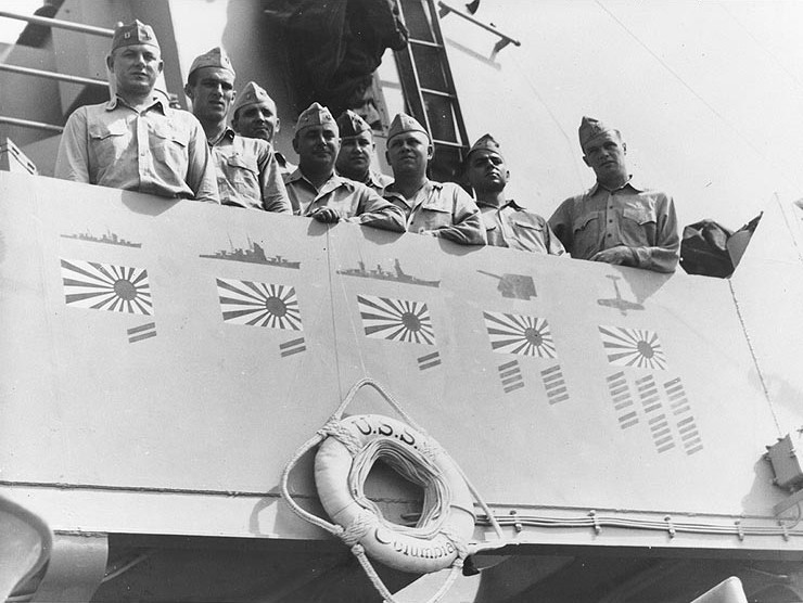 Plankowner officers of USS Columbia at the ship's bridge, late 1945.
