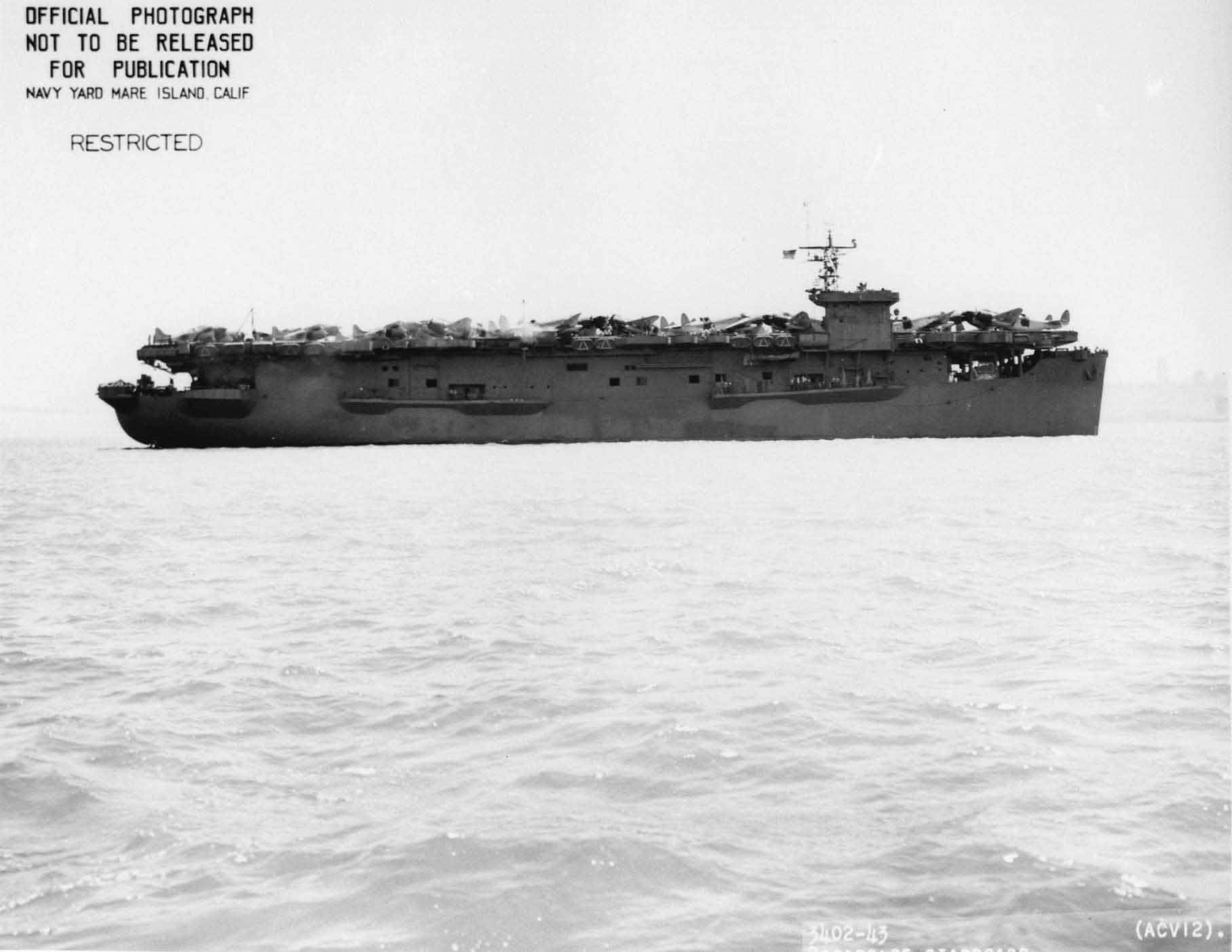 USS Copahee in San Francisco Bay, California, United States, 9 May 1943, photo 2 of 3; note TBD Devastator and PV-1 Ventura aircraft on flight deck