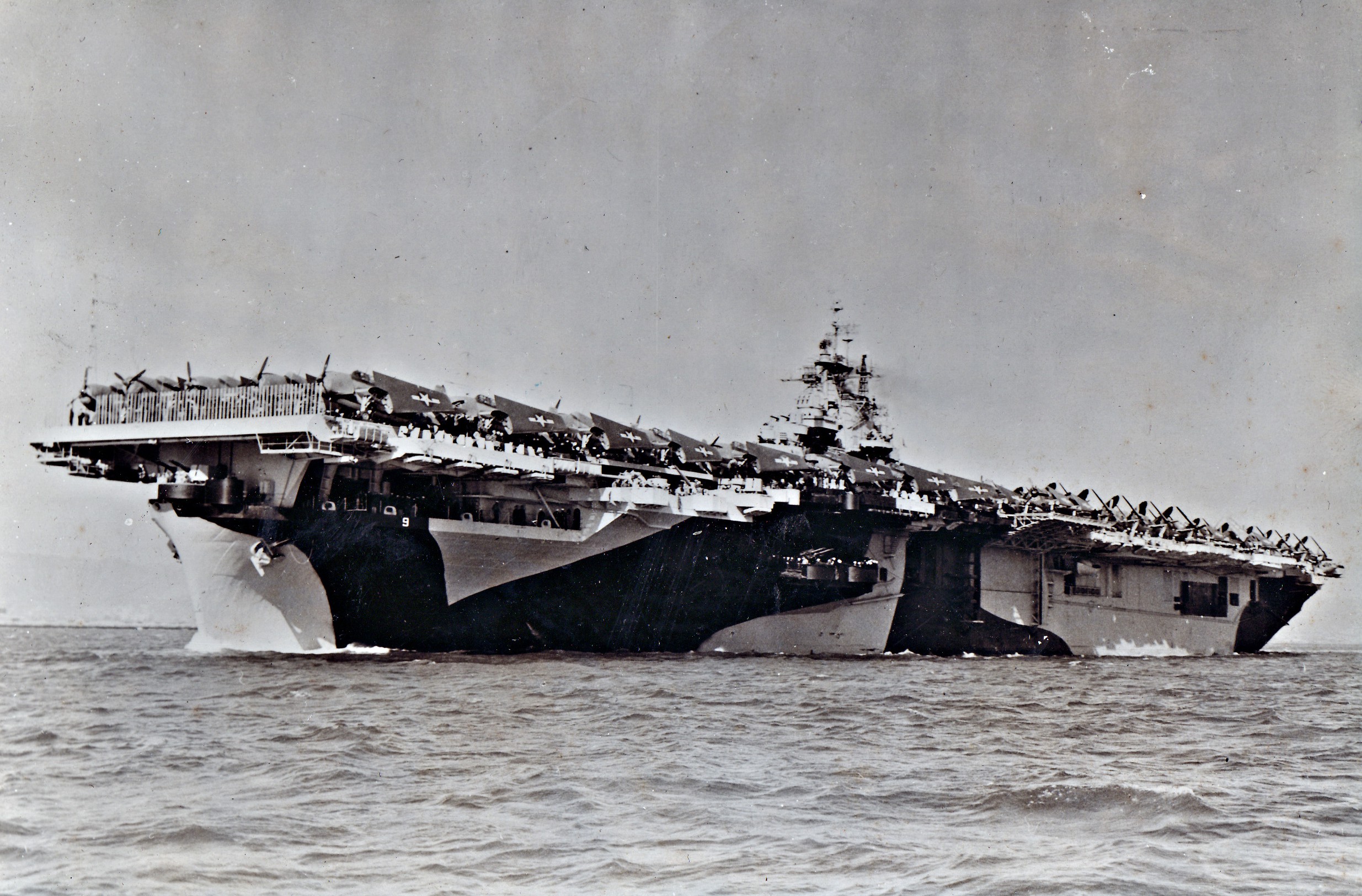 USS Essex departing San Francisco Naval Shipyard, California, United States, 15 Apr 1944, photo 2 of 4; note camouflage measure 32 design 6/10D