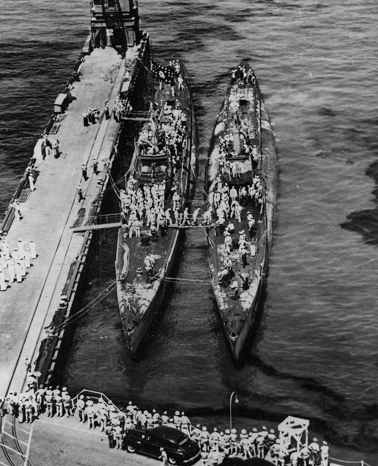 Two of Hydeman's Hellcats upon their return from Operation Barney: USS Flying Fish and USS Spadefish in port, Pearl Harbor, US Territory of Hawaii, 4 Jul 1945