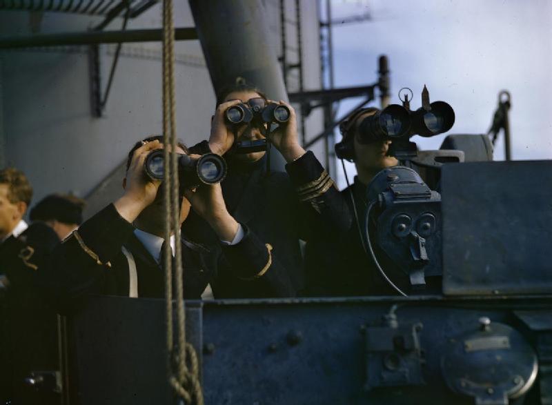 Personnel aboard HMS Formidable observing the invasion beach at Algiers, Algeria, 8 Nov 1942, photo 1 of 2