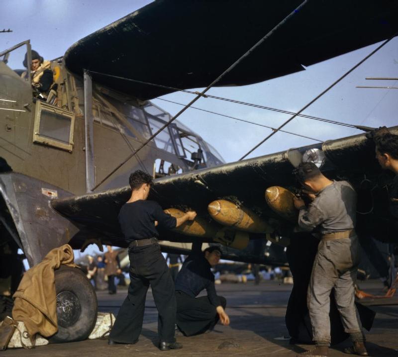 Armorers equipping an Albacore aircraft aboard HMS Formidable, off North Africa, Nov 1942