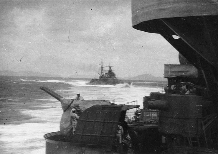 Haguro steaming in the wake of another cruiser, 1937; note the 127mm/40 twin antiaircraft gun and gun director in the foreground
