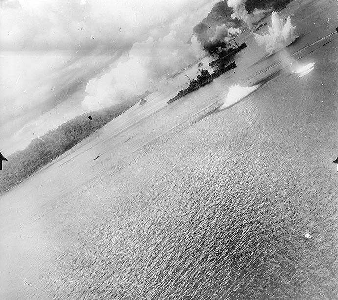 USAAF 3rd Bomb Group aircraft attacking Haguro and other ships in Simpson Harbor, Rabaul, New Britain, 2 Nov 1943, photo 1 of 2