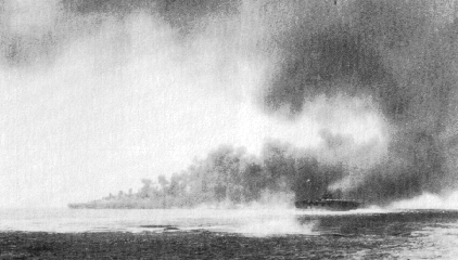 Damaged USS Hancock hiding in smoke, off Okinawa, Japan, 7 Apr 1945