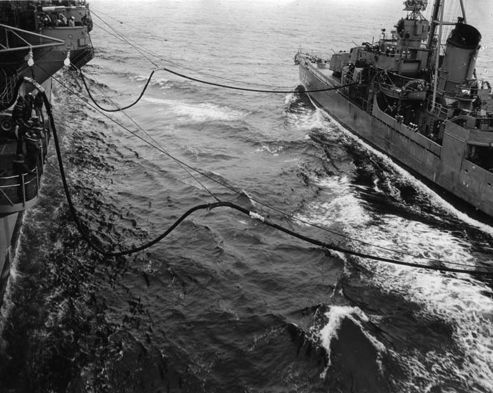 USS Porterfield refueling from USS Hancock, 1954, photo 1 of 3