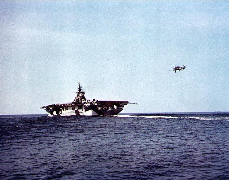 F6F Hellcat fighter landing on USS Hancock, circa 1944; note Hancock's camouflage Measure 32, Design 3a