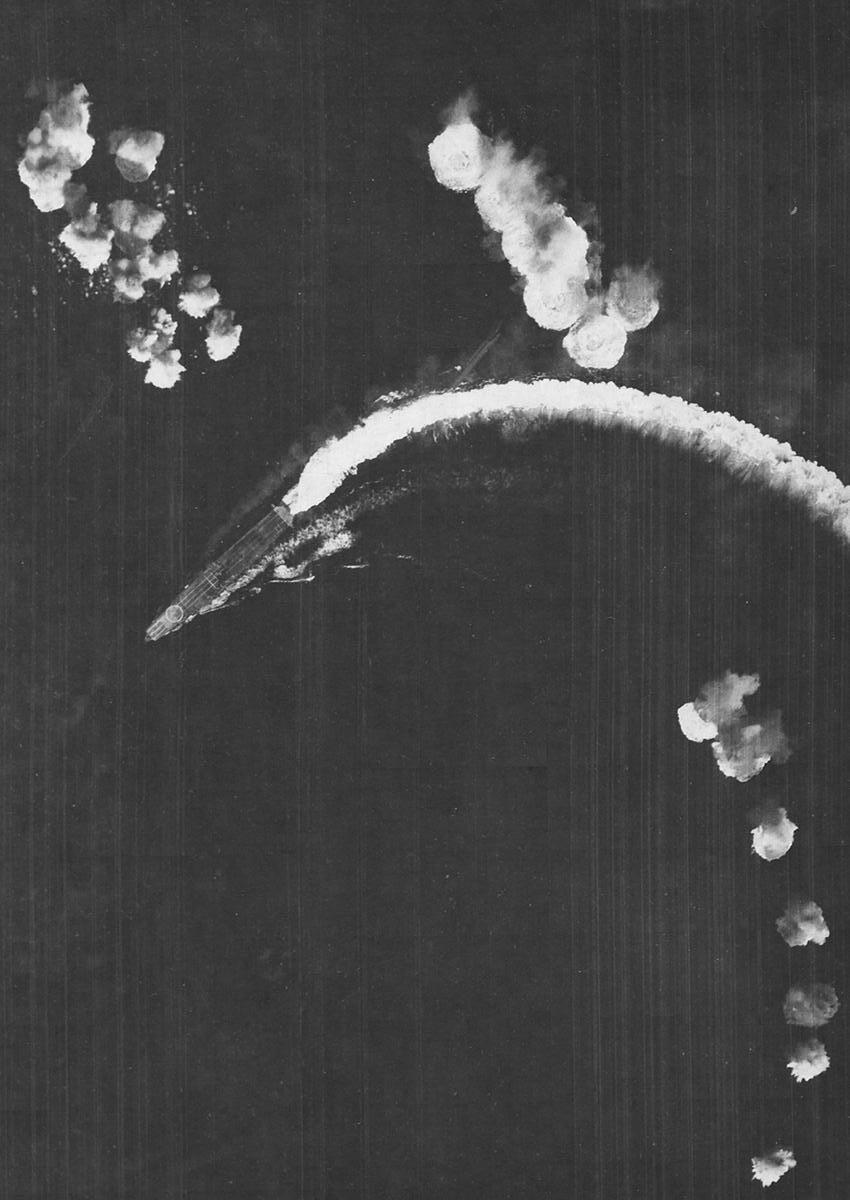 Hiryu maneuvering to avoid three sticks of bombs dropped by B-17 bombers, off Midway Atoll, shortly after 0800 hours, 4 Jun 1942, photo 1 of 2