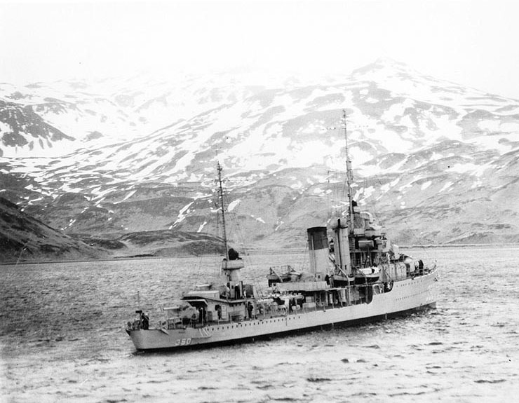 Hull approaching an anchorage in the lower end of Iliuliuk Bay, in the Aleutian Islands, North Pacific, 27 Apr 1937