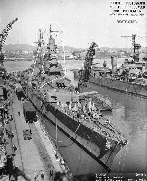 Indianapolis at Mare Island Navy Yard, California, view of her bow from starboard side, with heavy cruiser Minneapolis in background, 1 May 1943