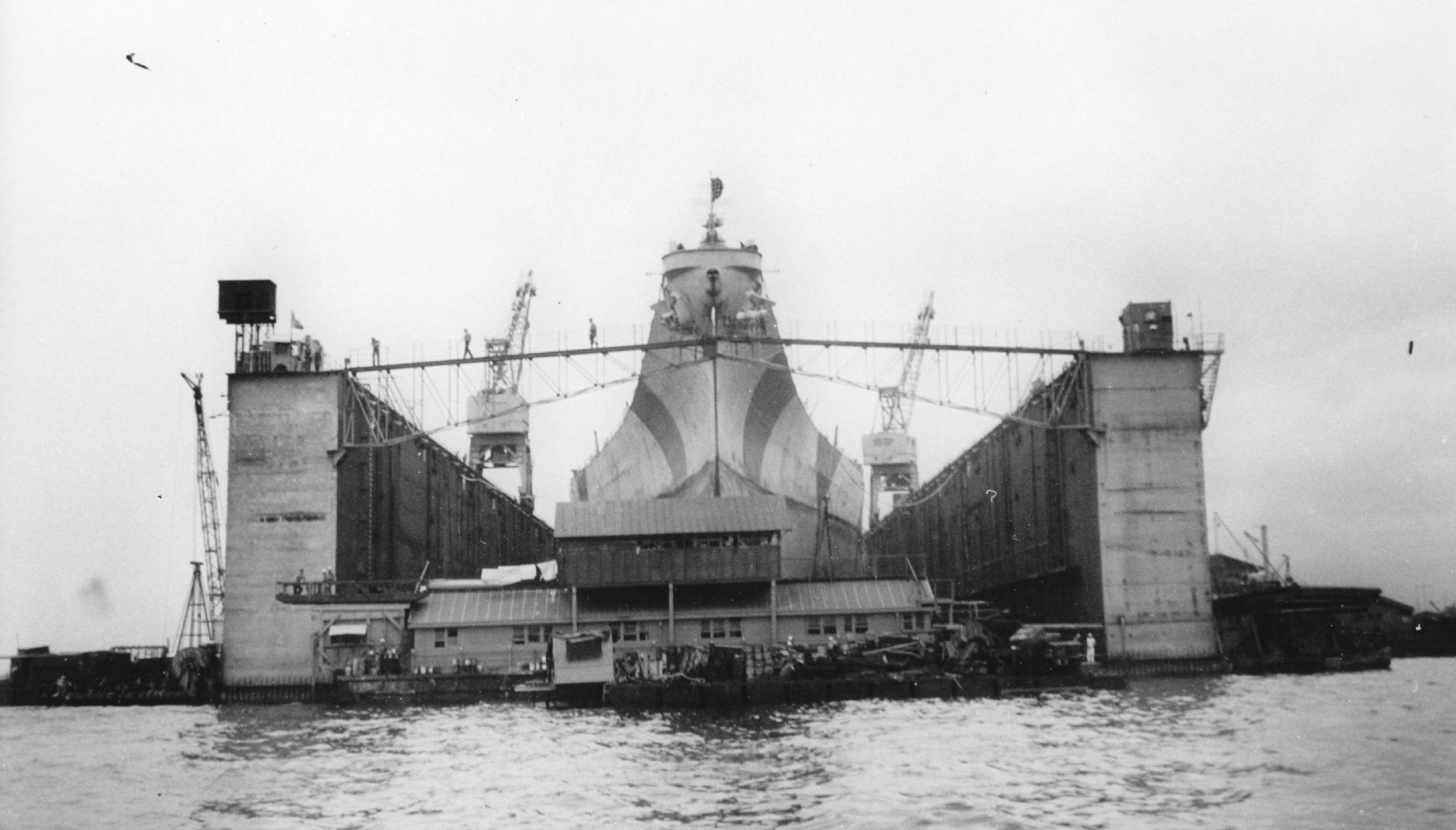 USS Iowa inside floating drydock ABSD-2, Seeadler Harbor, Manus, Admiralty Islands, 28 Dec 1944, photo 1 of 4