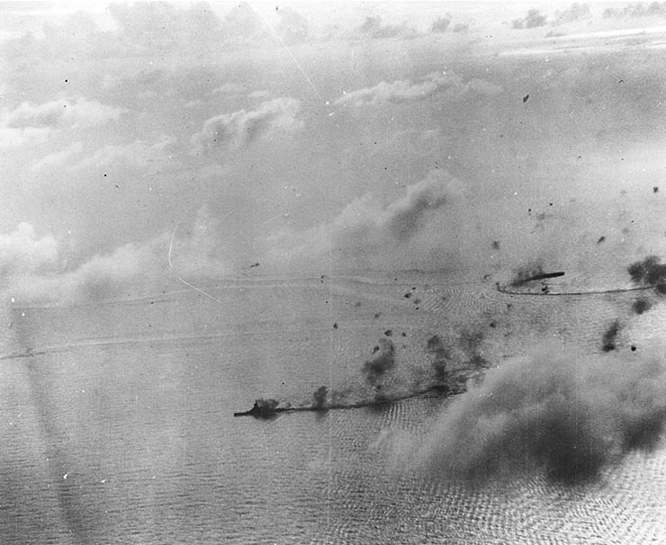 Japanese Carrier Division Three's battleship Kongo and carrier Chiyoda under attack by American carrier aircraft of Task Force 38 during the Battle of the Philippine Sea, 20 Jun 1944