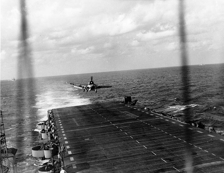 F6F Hellcat fighter landing on USS Langley, Ryukyu Islands, Japan, 10 Oct 1944