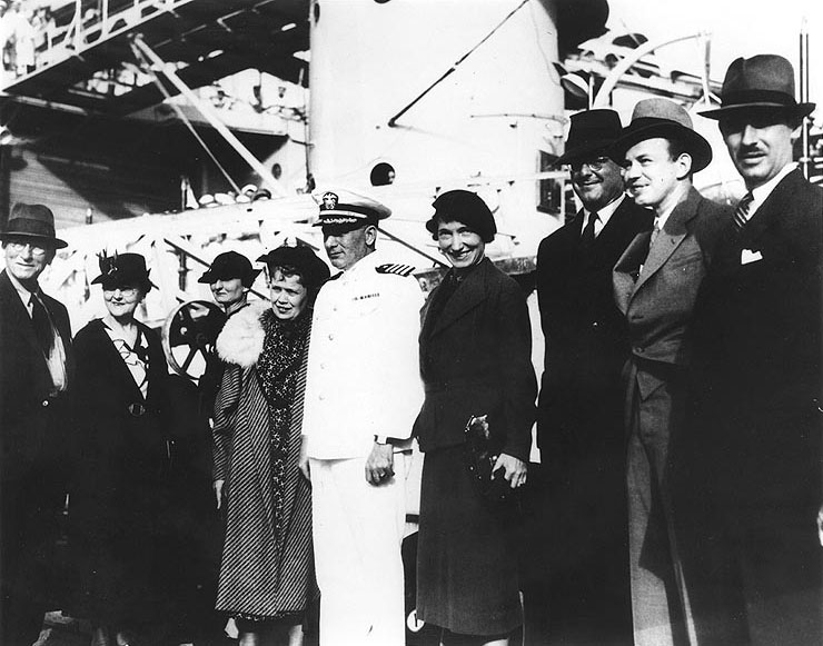 Survivors of the British Motor Ship Silver Larch posed with Louisville's Commanding Officer, Captain William S. Farber, upon their arrival at Pearl Harbor, Hawaii, 14 Mar 1937