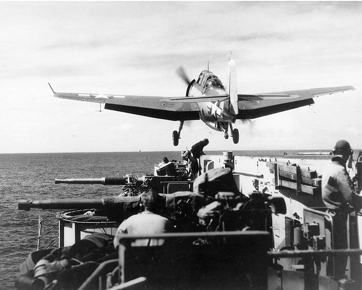 TBM-3 Avenger aircraft launching from USS Makin Island en route Wakayama, Japan to cover the evacuation of Allied prisoners of war, Sep 1945