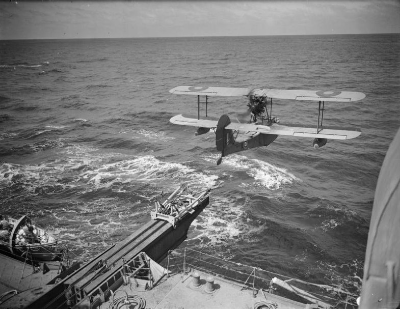Walrus seaplane being launched from HMS Mauritius, date unknown, photo 2 of 2