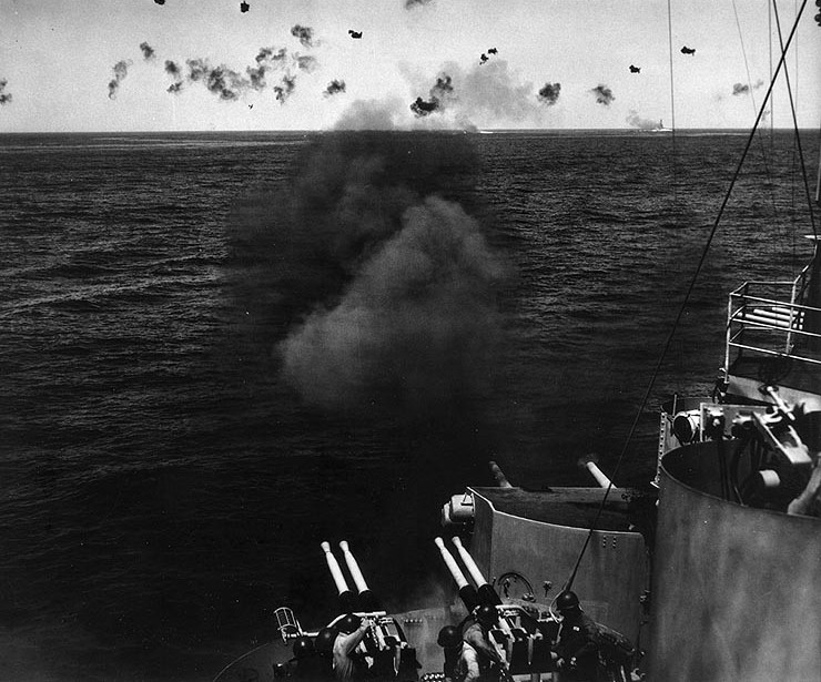 Gunners aboard USS Miami firing at Japanese aircraft, off Okinawa, Japan, 14 Apr 1945