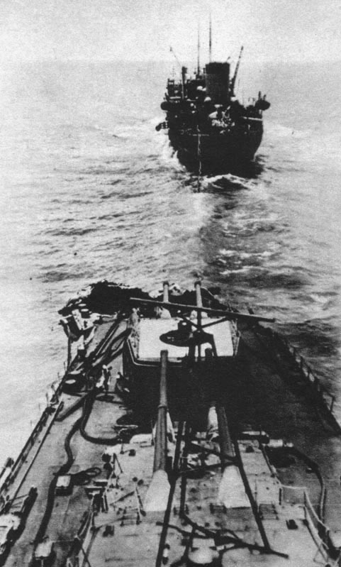 Mogami with damaged bow, Pacific Ocean, 6 Jun 1942; note Japanese national flag on top of turret (which helped identify Mogami in this photograph) and tanker Nichiei Maru in background