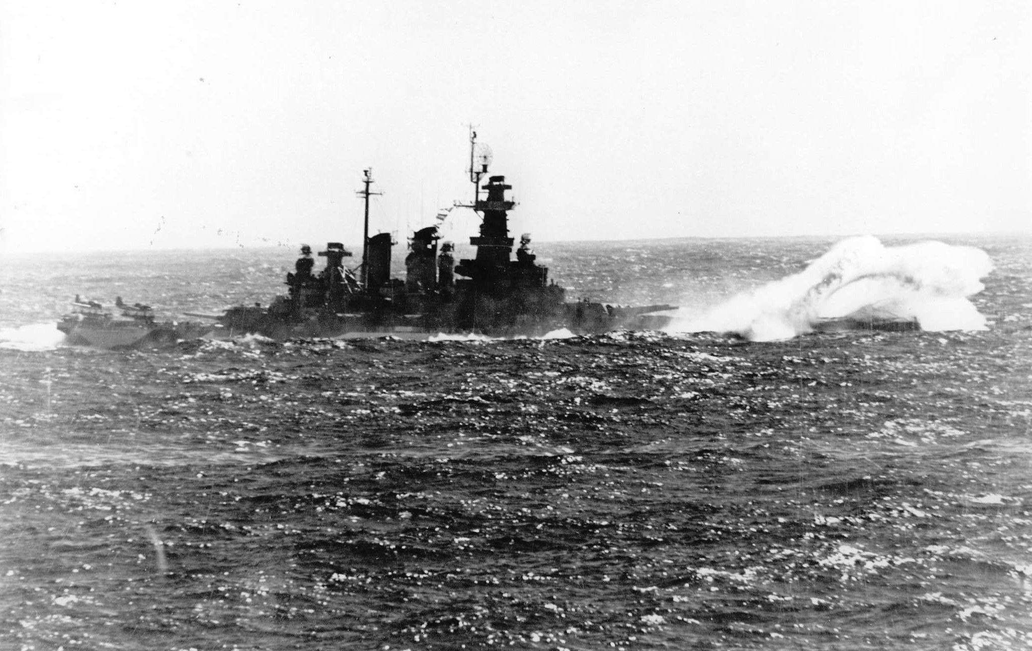 USS North Carolina in heavy seas, off the Philippine Islands, 12 Dec 1944, photo 2 of 2