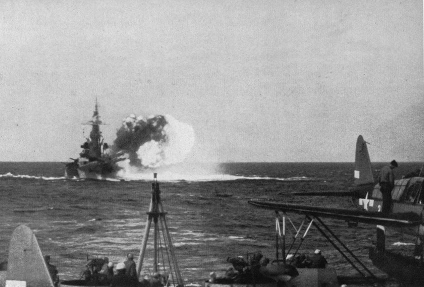 USS North Carolina bombarding Nauru, 8 Dec 1943; note OS2U Kingfisher aircraft in foreground