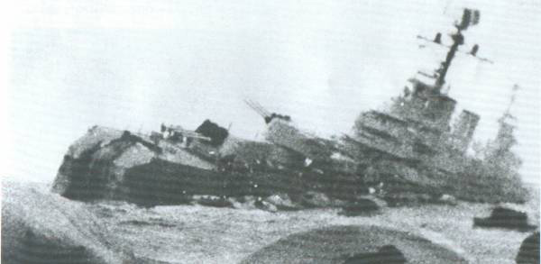 Argentine cruiser General Belgrano sinking after being torpedoed by HMS Conqueror, off Falkland Islands, 2 May 1982
