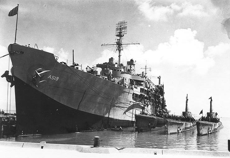 Submarine tender USS Proteus with submarines Bang, Pintado, and Pilotfish at Midway Atoll, 15 May 1944