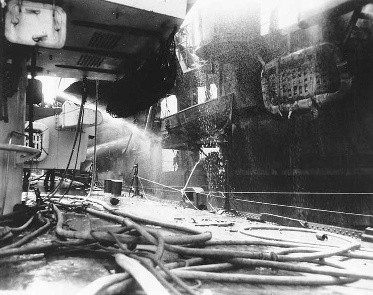 Birmingham assisted with firefighting on Princeton, seen from foredeck, 24 Oct 1944