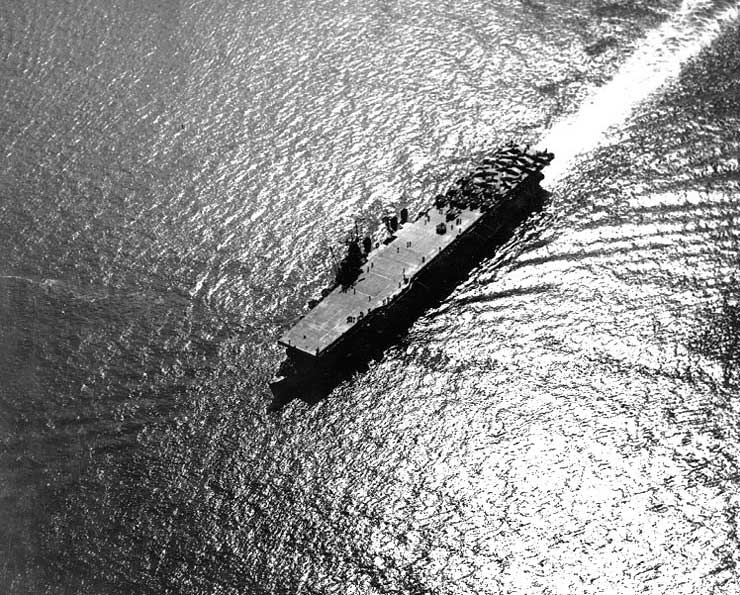 Light Carrier USS Princeton with a deck full of aircraft on her shakedown cruise, 31 May 1943 off Antigua. Photo 2 of 4