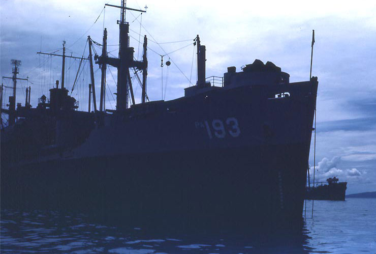 View of APA-193 Sanborn's starboard bow at dawn or dusk, circa late-1944 to 1945