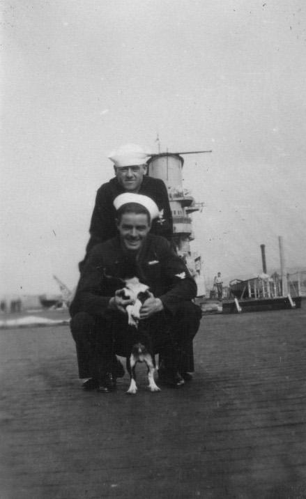 Sailors of USS Saratoga with the ship's canine mascot, 1927-1928