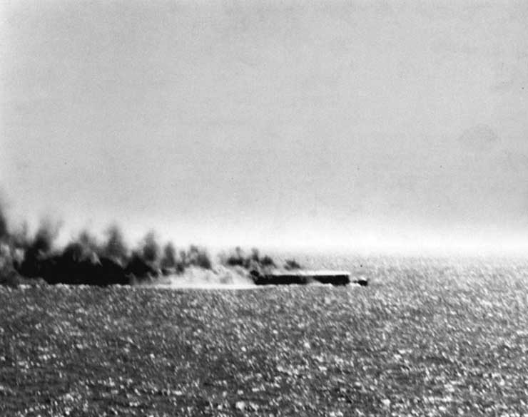 Shoho burning during Battle of Coral Sea, photographed by a torpedo bomber pilot from Yorktown, 7 May 1942