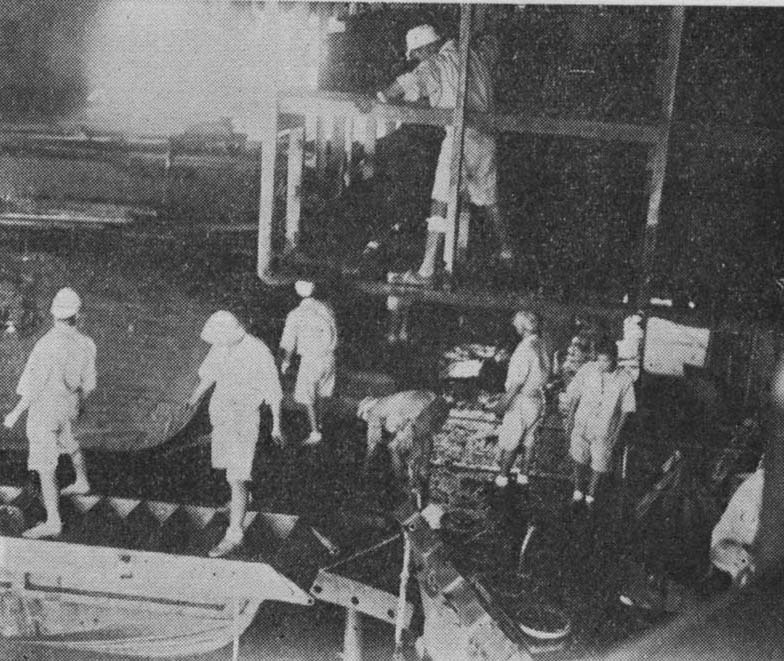 Repair activities aboard Shokaku's boat deck, damaged by the second bomb that hit her during the Battle of Coral Sea, Kure, Japan, between 17 May and 27 Jun 1942