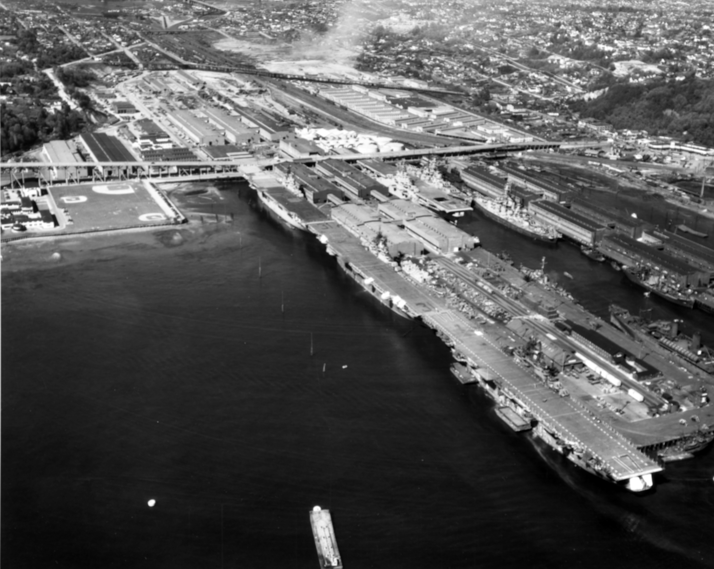 USS Bunker Hill, USS Bon Homme Richard, USS Essex, USS Ticonderoga, USS Indiana, and USS Alabama at Pier 92, Seattle, Washington, United States, 9 Jan 1947