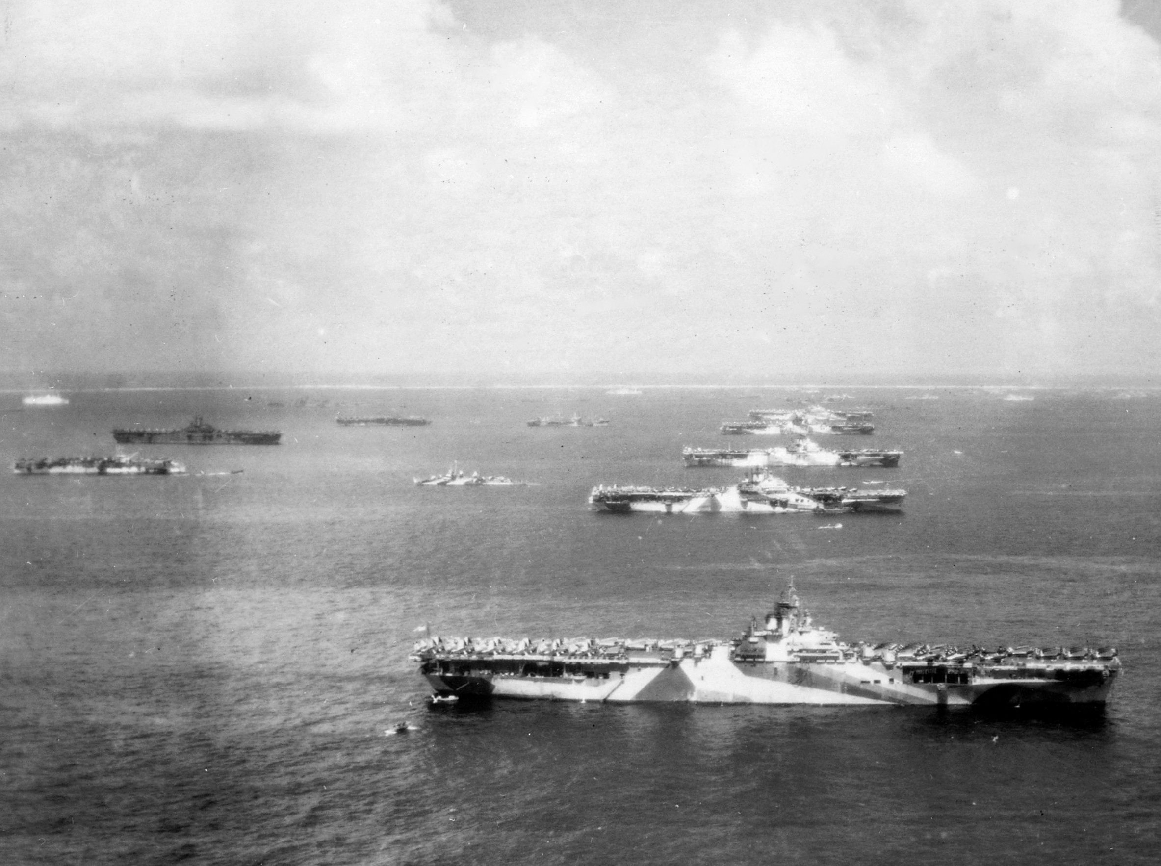 USS Wasp, USS Yorktown, USS Hornet, USS Hancock, USS Ticonderoga, and other warships at Ulithi Atoll, Caroline Islands, 8 Dec 1944, photo 1 of 3